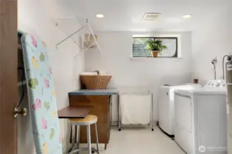 Huge lower level laundry room.