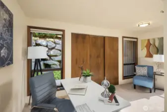 The third main-level bedroom offers two large closets, including one with washer and dryer hookups (not shown).