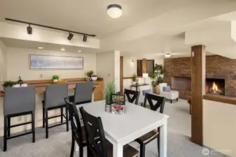 Another look at the lower-level living area, which has private access and a door separating it from the rest of the home—ideal as a separate living space. Both this level and the main level include washer and dryer hookups.