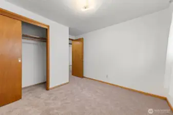 One of three bedrooms