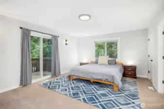 Primary bedroom with private balcony