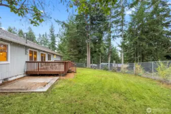 Fully fenced backyard with slab for potential spa