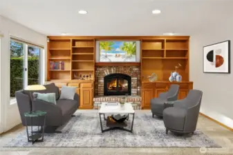 Cozy up to the gas fireplace in fall and winter. Image is virtually staged for visualization purposes.