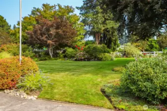 The park-like grounds have been meticulously maintained by the sellers for 36 years.