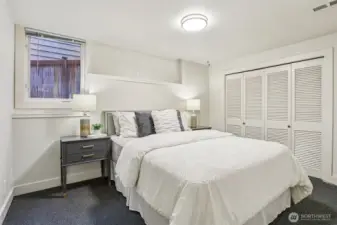 Downstairs, a third bedroom and bathroom are also a part of the main living area, separate from the ADU.