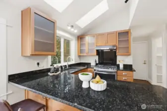 Skylights throughout this amazing light filled home