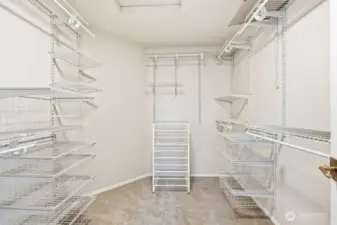 Large walk in closet space with organizers