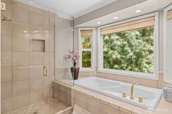 Large soaking tub and shower.