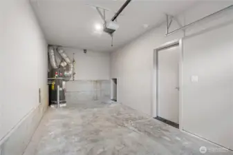 EV equipped private garage, accessed off of the kitchen. Don't miss the bonus storage closet in the garage!