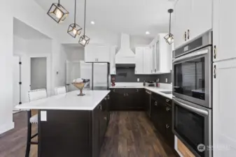 Beautiful quartz counter tops and Stainless appliances.