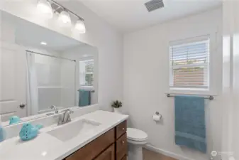 The full bath separates the two bedrooms.