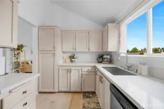 Light and bright kitchen with quartz counter tops