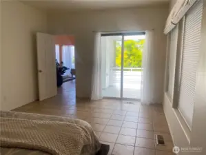PRIMARY BEDROOM WITH PRIVATE DECK