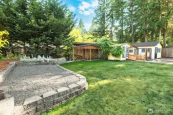 Backyard with woodshed, chicken-coup, and workshop