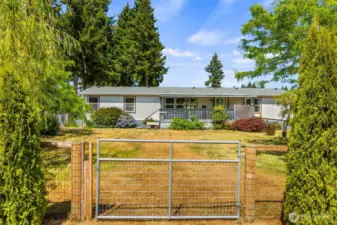 Large gate from exterior yard into the interior yard.