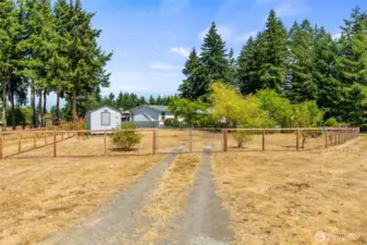 This lot is double fenced, with a gated entry and smaller gated fence inside for your pets.