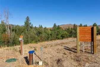 Well and cistern installed for water security.