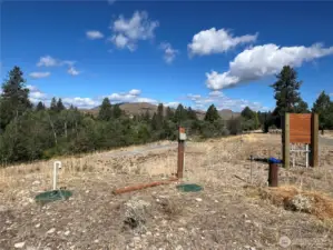 A rare opportunity: sunny, treed lot near town with all key infrastructure in place.