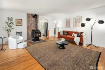 Entry to kitchen on left; hallway to bath and second bedroom on right.