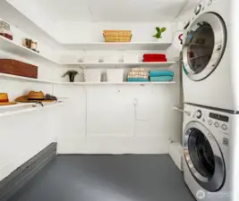 Mud room/laundry with access to back and side yards. Tons of storage her.