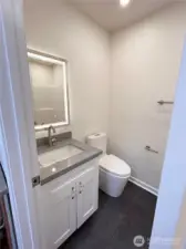 Slate floors in mudroom full bathroom, perfect for cleaning up after a day on the lake!