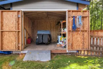 Large shed will hold all your yard equipment.