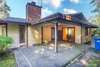Back patio will be perfect for BBQing! Privacy abounds with mature landscaping.