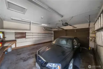 Plenty of room for 2 vehicles and work bench area.