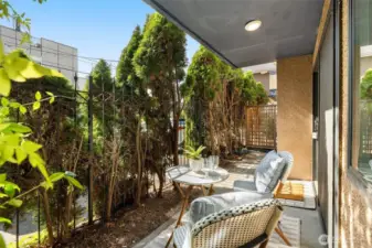 Privacy trees insulate patio space & unit entrance