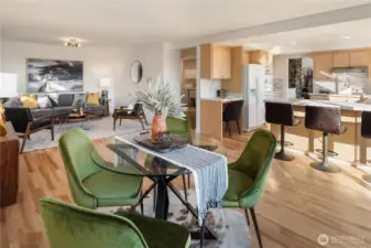 Looking across the family room gives you a sense of just how big this room is. A powder room is just behind the wall mirror off the hallway.