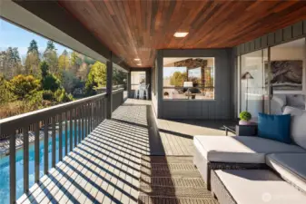 This spacious part of the upper deck is fully covered with cedar soffits overhead.