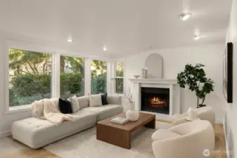 Family room off kitchen with an additional fireplace