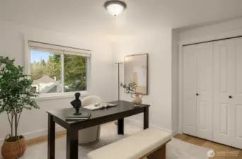 1 of 4 large bedrooms upstairs, and its currently staged as an office