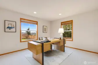 Main floor bedroom is currently staged as office space.