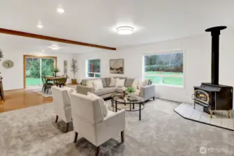 Living room open to dining and kitchen