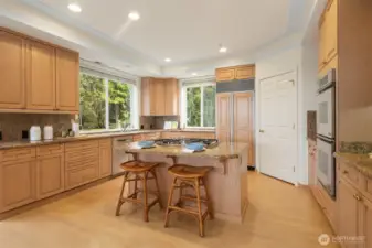 Cooks will delight in the generous kitchen with elite built-in appliances.