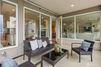Grab your favorite beverage and step out to the covered balcony.