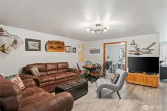Downstairs, you'll find the large rec room/family room. It's so spacious down here that you have many different possibilities for living arrangements.