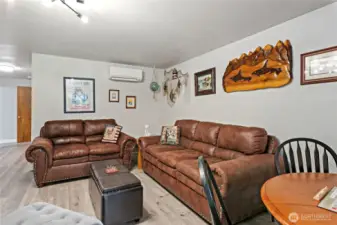 Tall ceilings and lots of light make this large area feel even more spacious!
