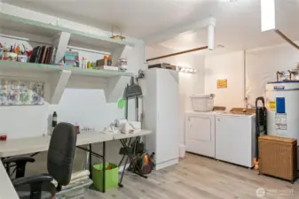 The huge laundry room doubles as a craft/hobby room. There is loads of storage here that isn't shown in the photo.