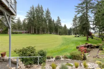 And wow! Look at how this landscaping blends in perfectly to the golf course.