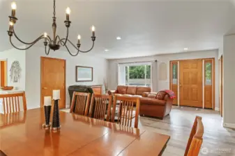 The dining, kitchen, and living areas blend seamlessly together.