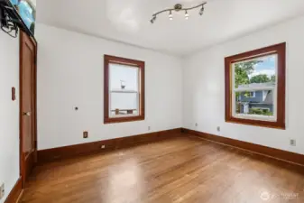 MAIN floor Bedroom 2 with window the rear yard