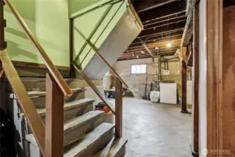 1100 sf basement w/door to garage and door to rear yard. HUGE space for future  potential apartment or additional living area.