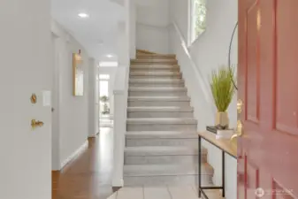 Entry stairs to bdrms, hall towards living rm
