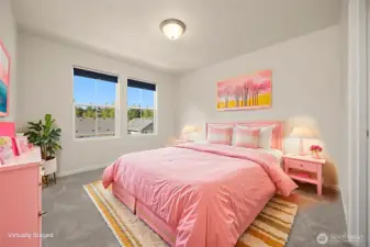 Virtually staged, this room features a large dressing-room style closet.