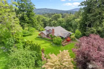 Welcome to 3905 Idaho St! 1st time on the market in over 90 years, this charming estate is situated on 2 acres and nicely tucked back off the road for privacy.
