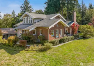 Gorgeous side and back view of the home with meticulous detailing on the brickwork. This home has a stately feel without being pretentious. It is a place you'll love to call home.