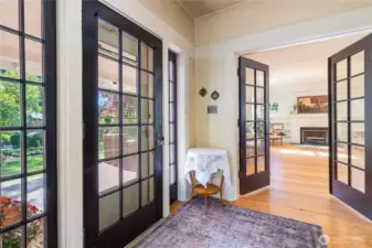 Step inside, where you'll notice the wall of windows that fill this entryway with natural light.