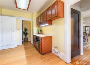 More cupboards! The door on the right leads to the stairs going up.